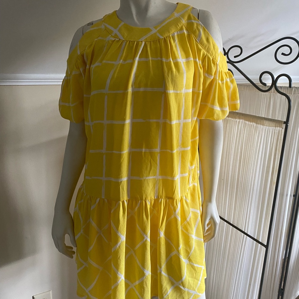 Babydoll sundress(lined) with peek a boo shoulders. Mini dress